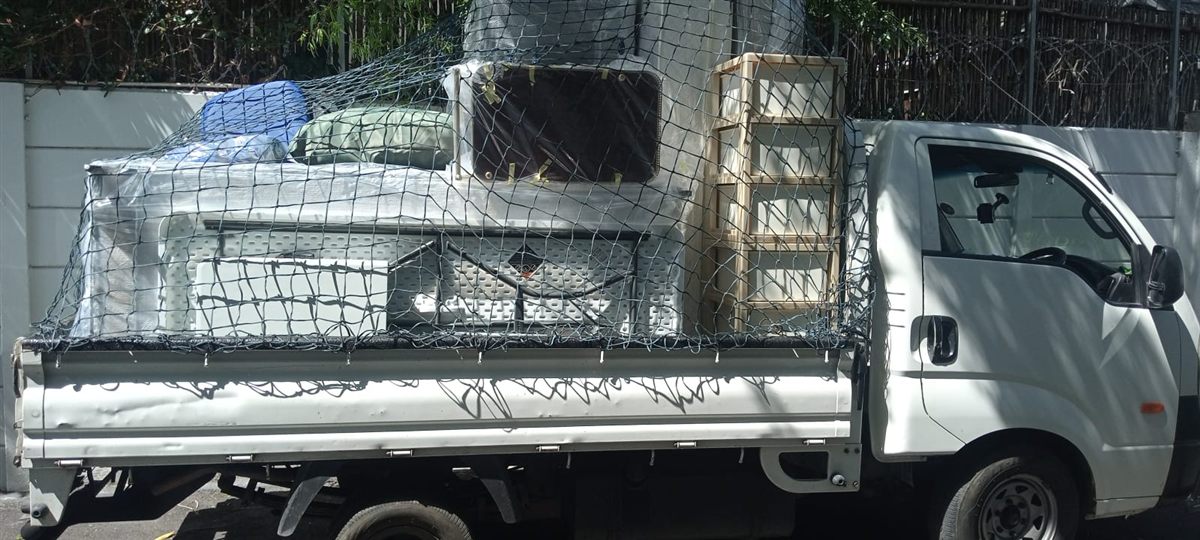 Truck loaded with household furniture